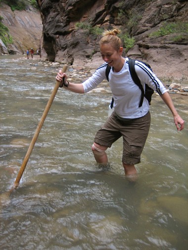 Stephanie negotiates some swift currents in the Virgin River at Zion National Park