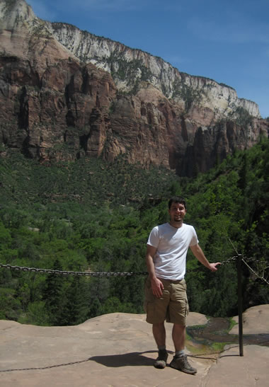 justin at the edge of the middle pool on the emerald pools trails at zion national park